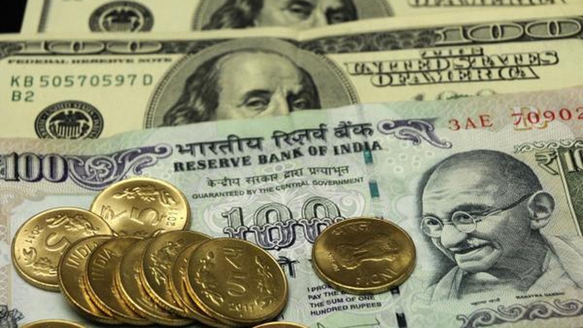 Rupee gains 12 paise to settle at 85.68 against U.S. dollar
