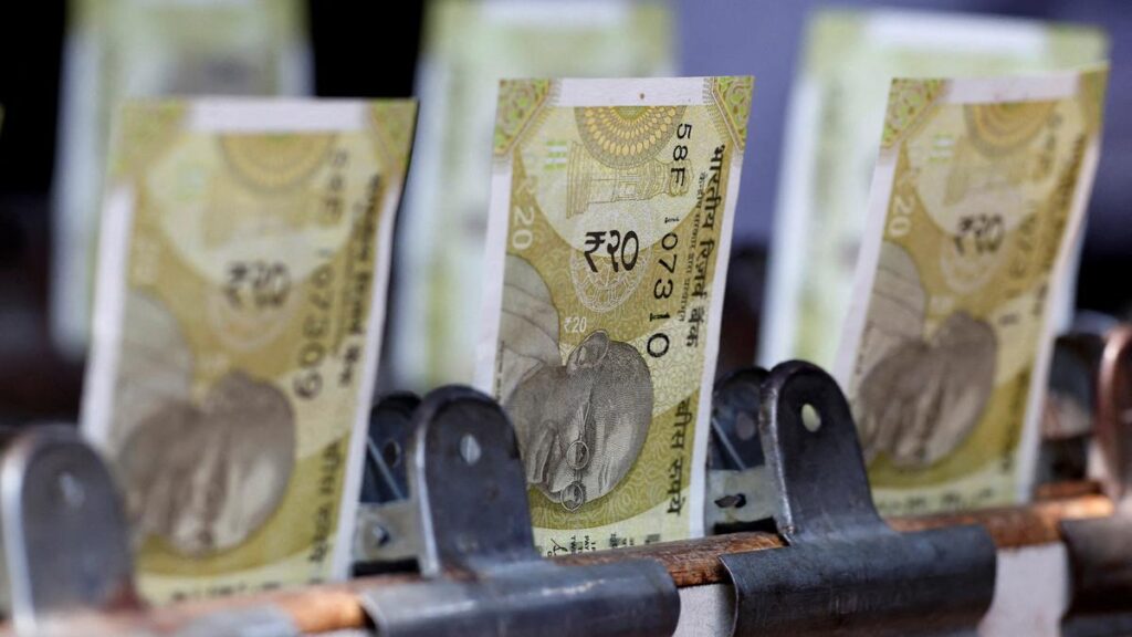 Rupee gains 10 paise to settle at 85.26 against U.S. dollar