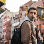 ‘Relay’ movie review: Riz Ahmed is the silky center of this throwback thriller