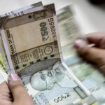 Rupee rebounds from lowest level to settle 45 paise higher at 91.60 against U.S. dollar