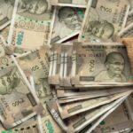 Rupee slumps to record low past ₹94 per dollar, set for worst fiscal in more than a decade